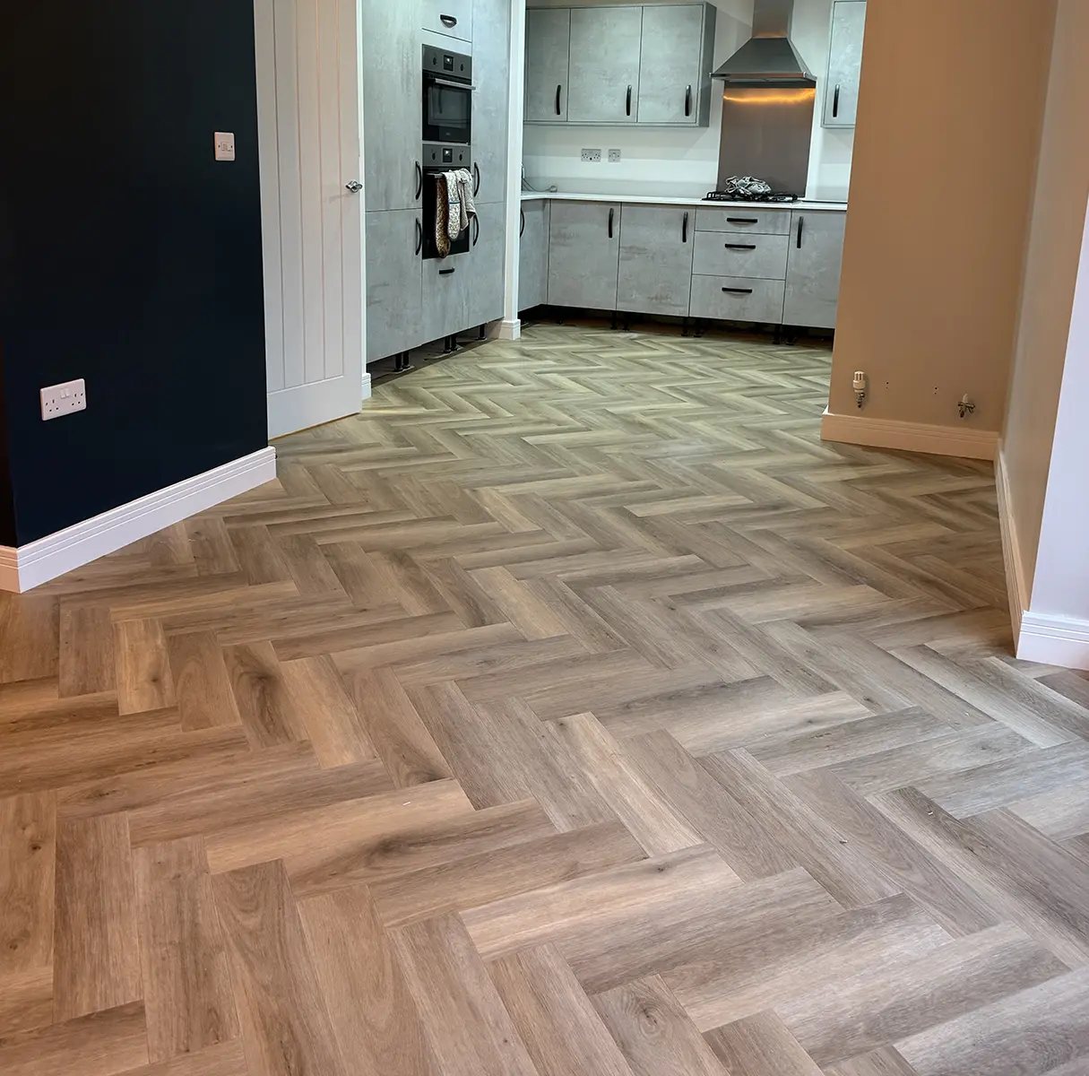 Luxury Vinyl Tiles Herringbone New Build